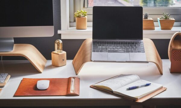 Free A stylish and contemporary home office setup with laptop and desk accessories. Stock Photo